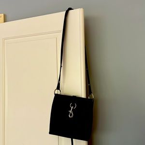 Rebecca Minkoff black leather ‘Feed Bag’ adjustable strap.